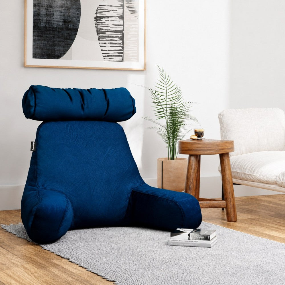 Cojín de suelo XL TheraLiving Royal TM414 en ambiente de living, ideal para crear un espacio cómodo de lectura y descanso.