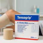 Venda tubular Tensogrip aplicado en pierna — compresión suave post-traumática BSN Medical